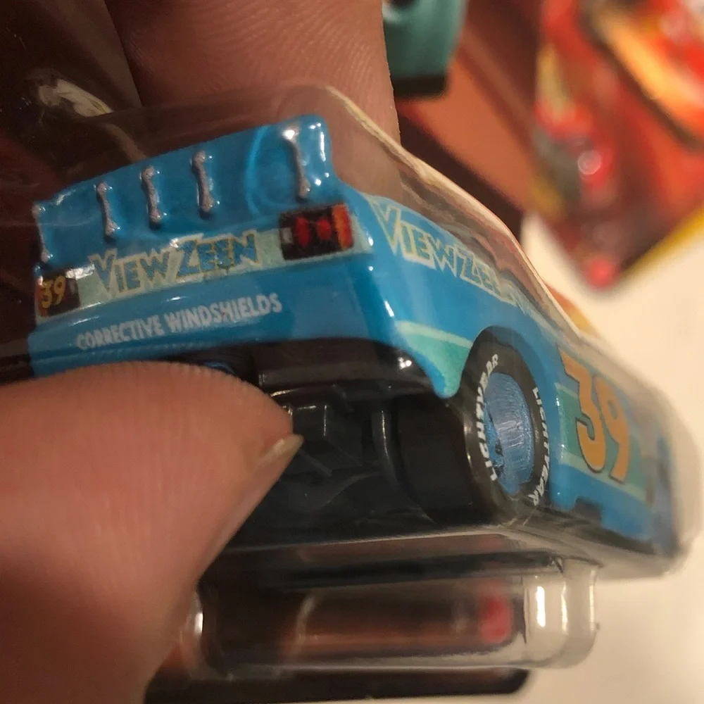 Mattel Pixar Cars Ryan Shields Die-Cast Toy Car - Teal and Yellow